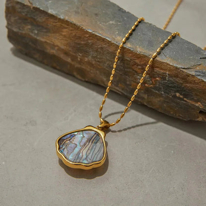 Nixie Gold Seashell Pendant
