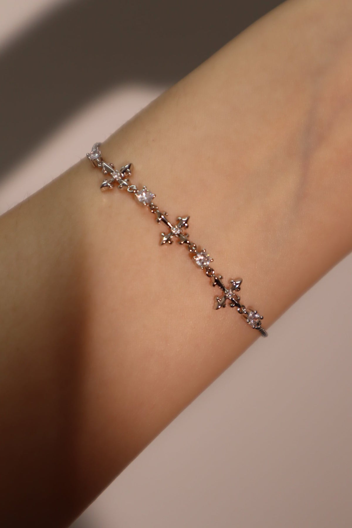 Palladium White Gold Plated Multi Diamond Cross Bracelet